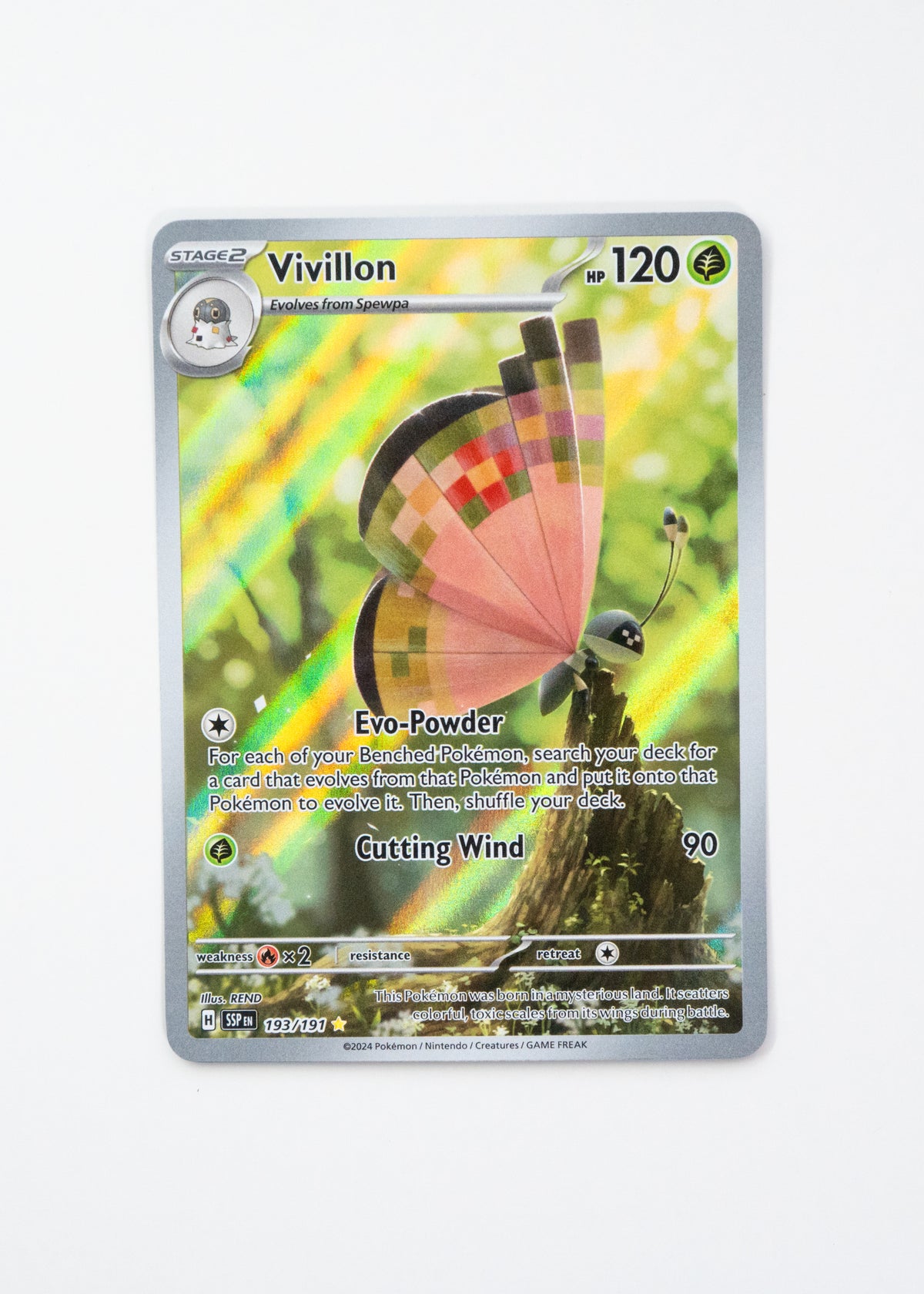 Vivillon Pokémon trading card with colorful design on a white background
