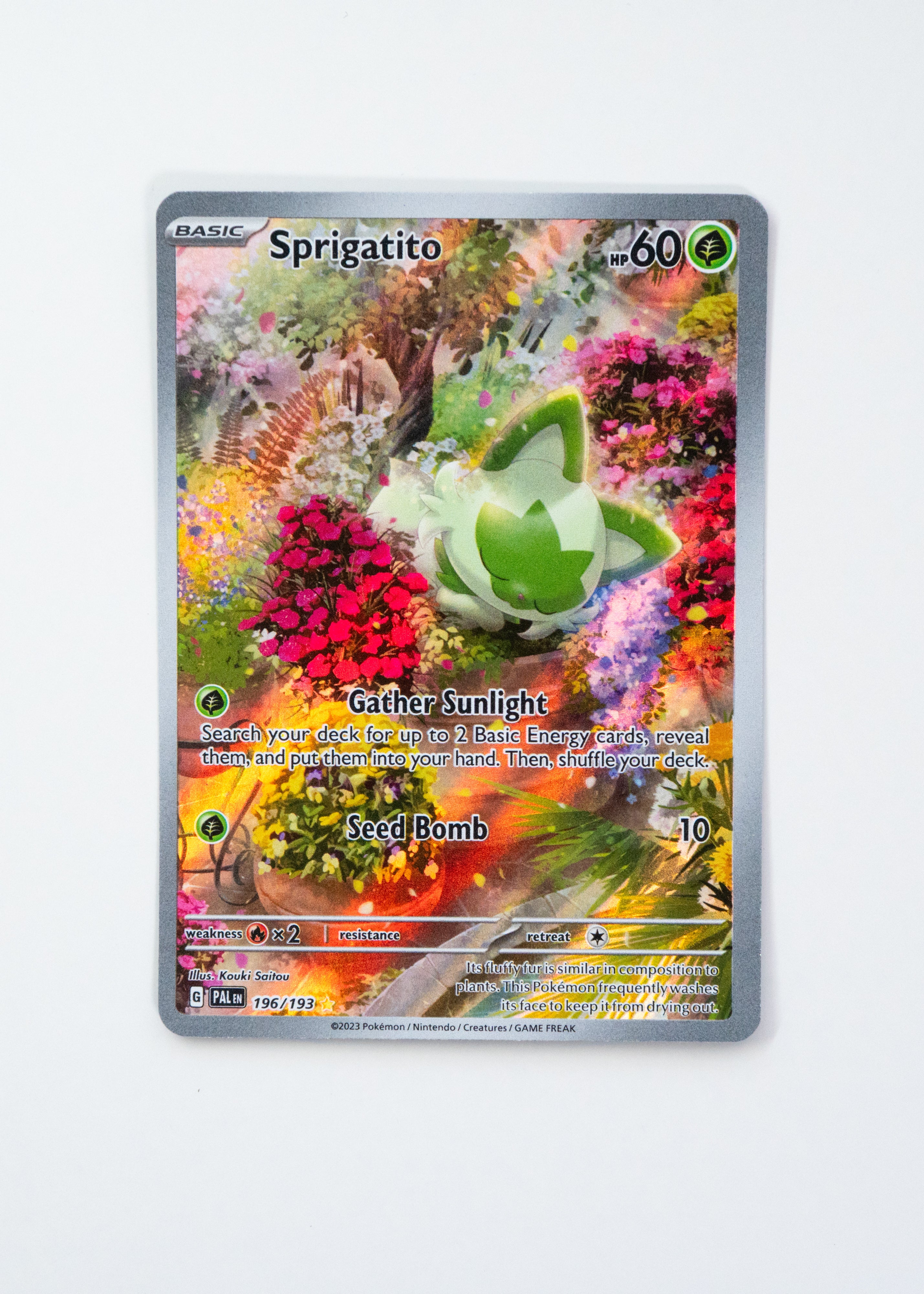 Pokémon trading card featuring Sprigatito on a white background