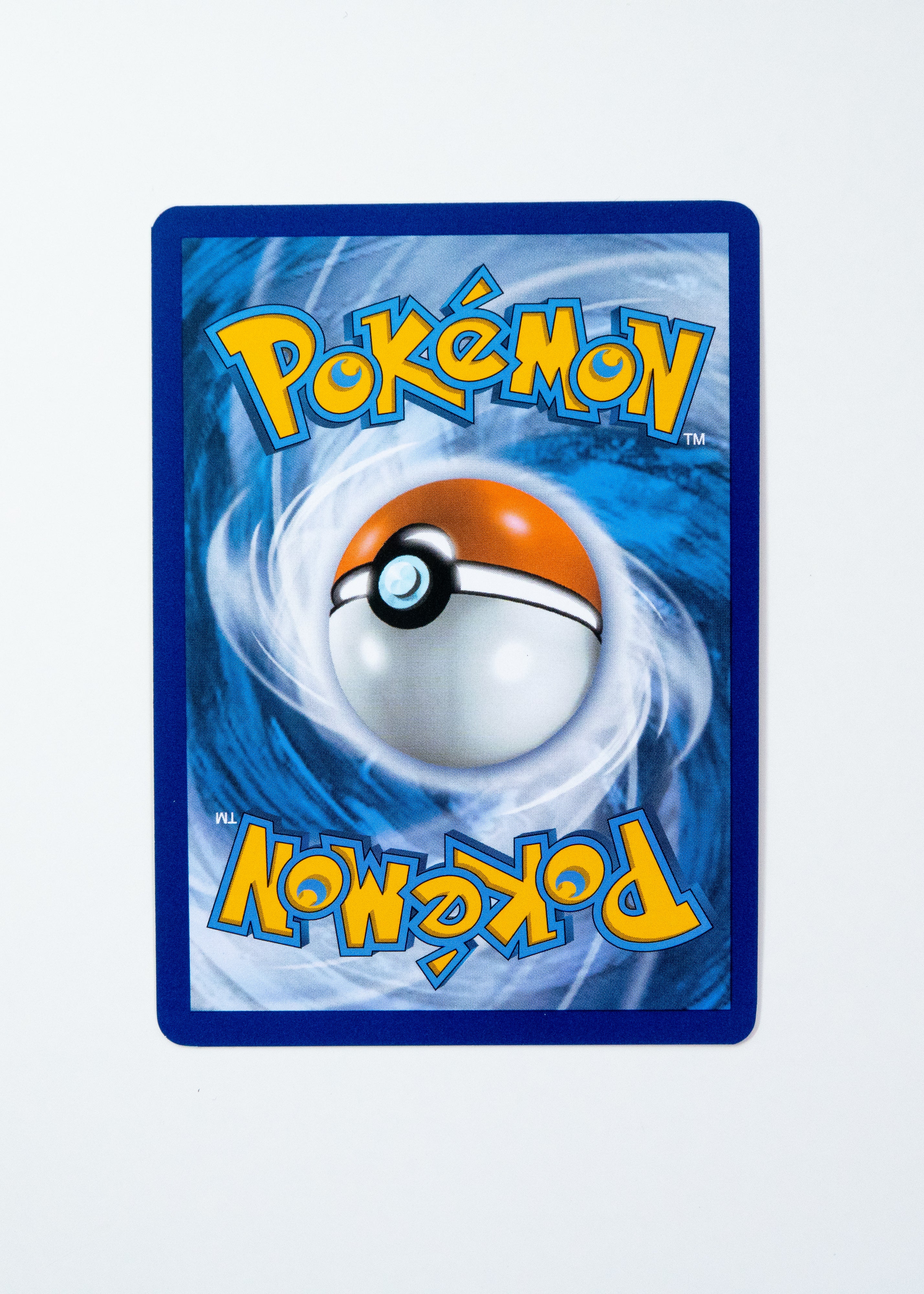 Pokémon trading card with a blue border and central Poké Ball design on a white background