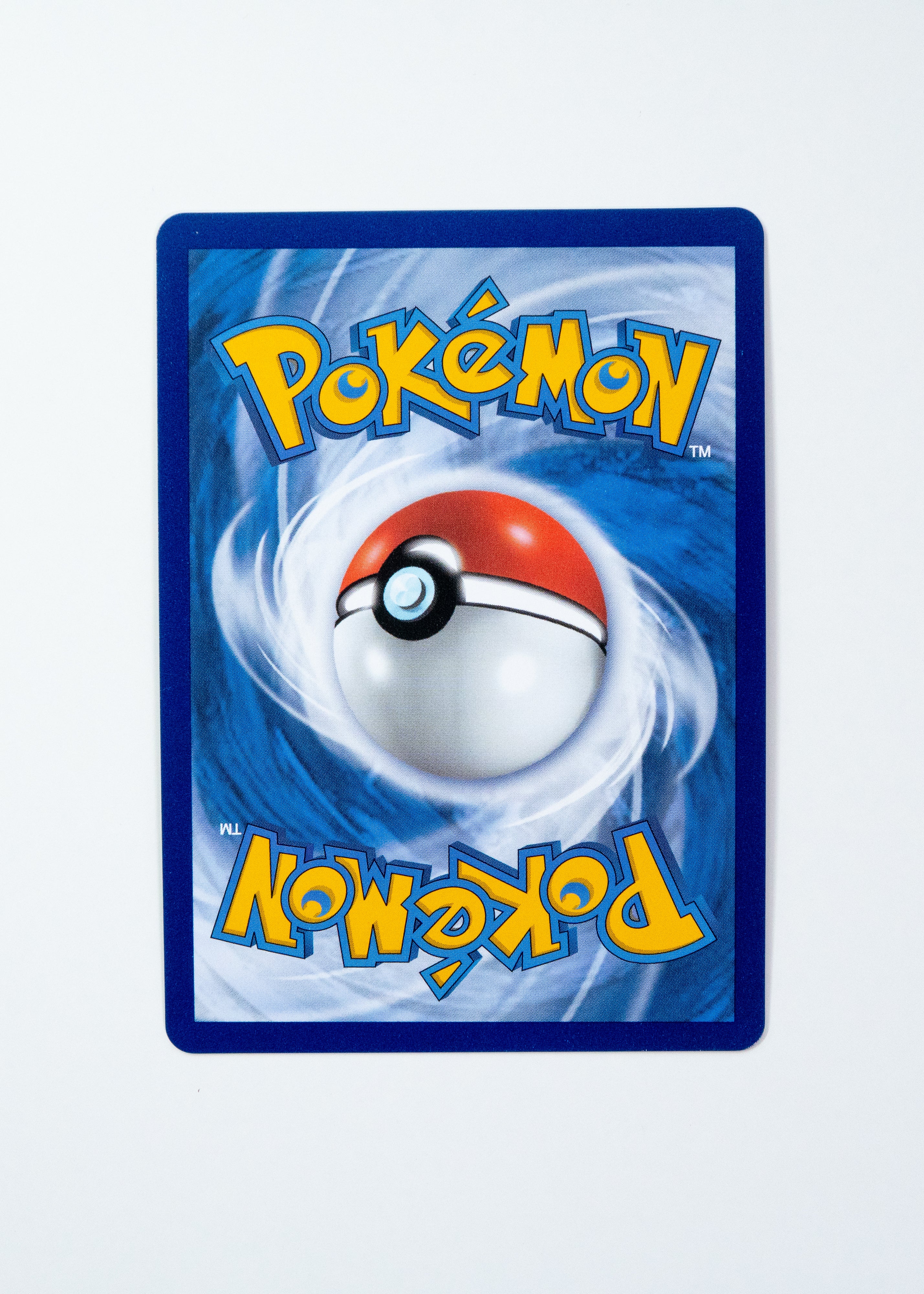 Pokémon trading card with blue border and central Pokéball design on a white background