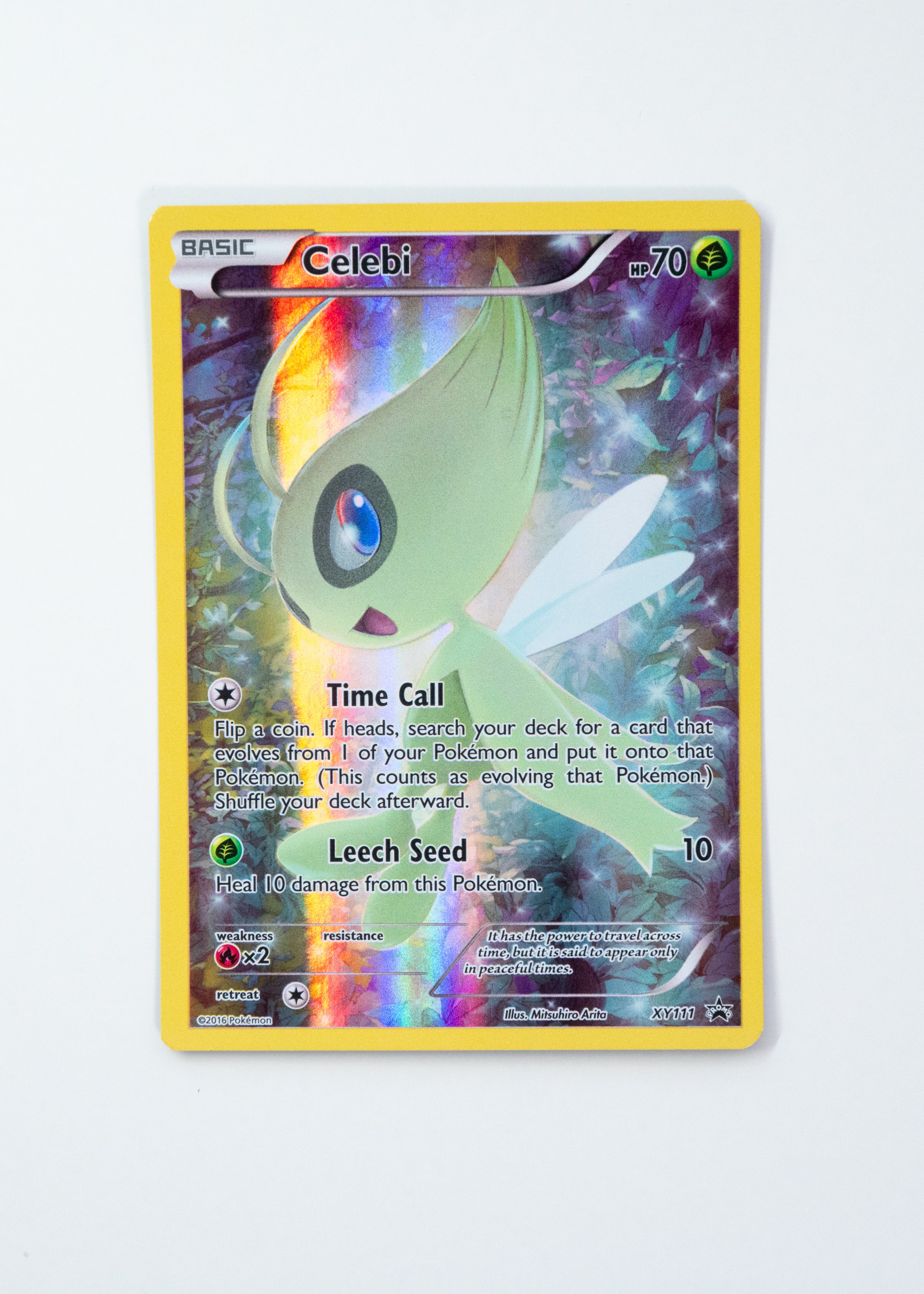 Celebi trading card with colorful design on a white background