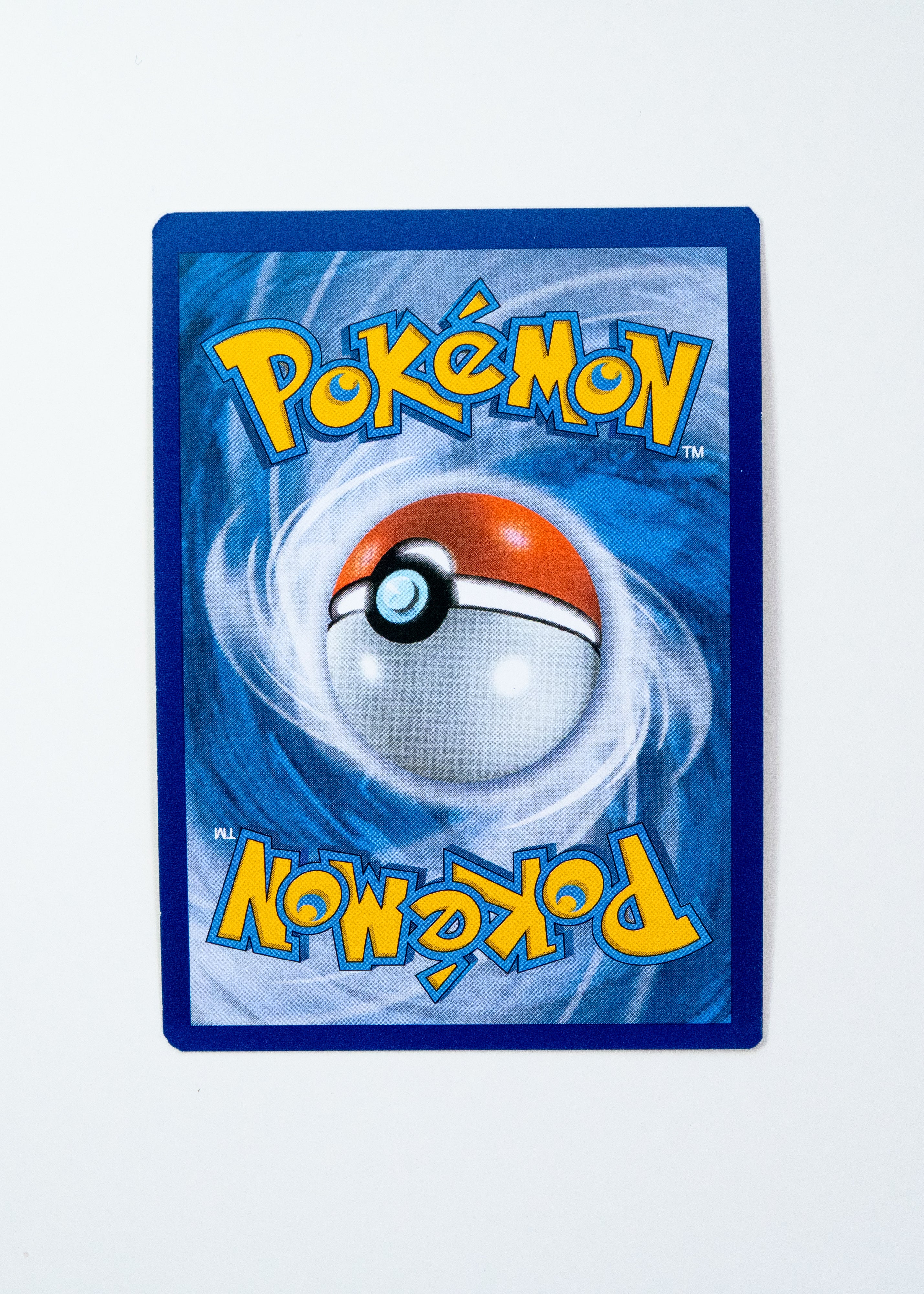 Pokémon trading card with a blue border and Pokéball design on a white background