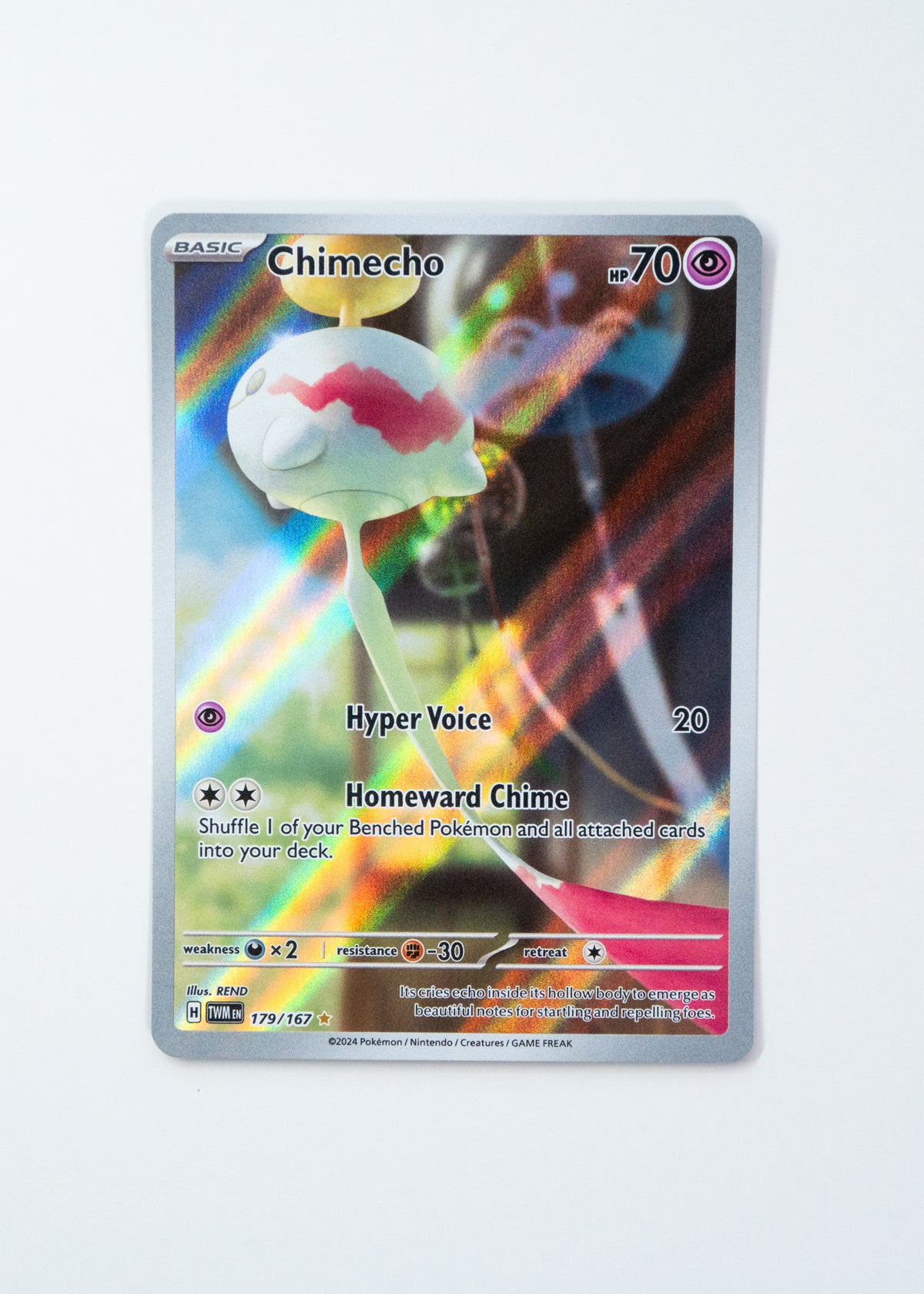 Pokémon trading card featuring Chimecho with a colorful background