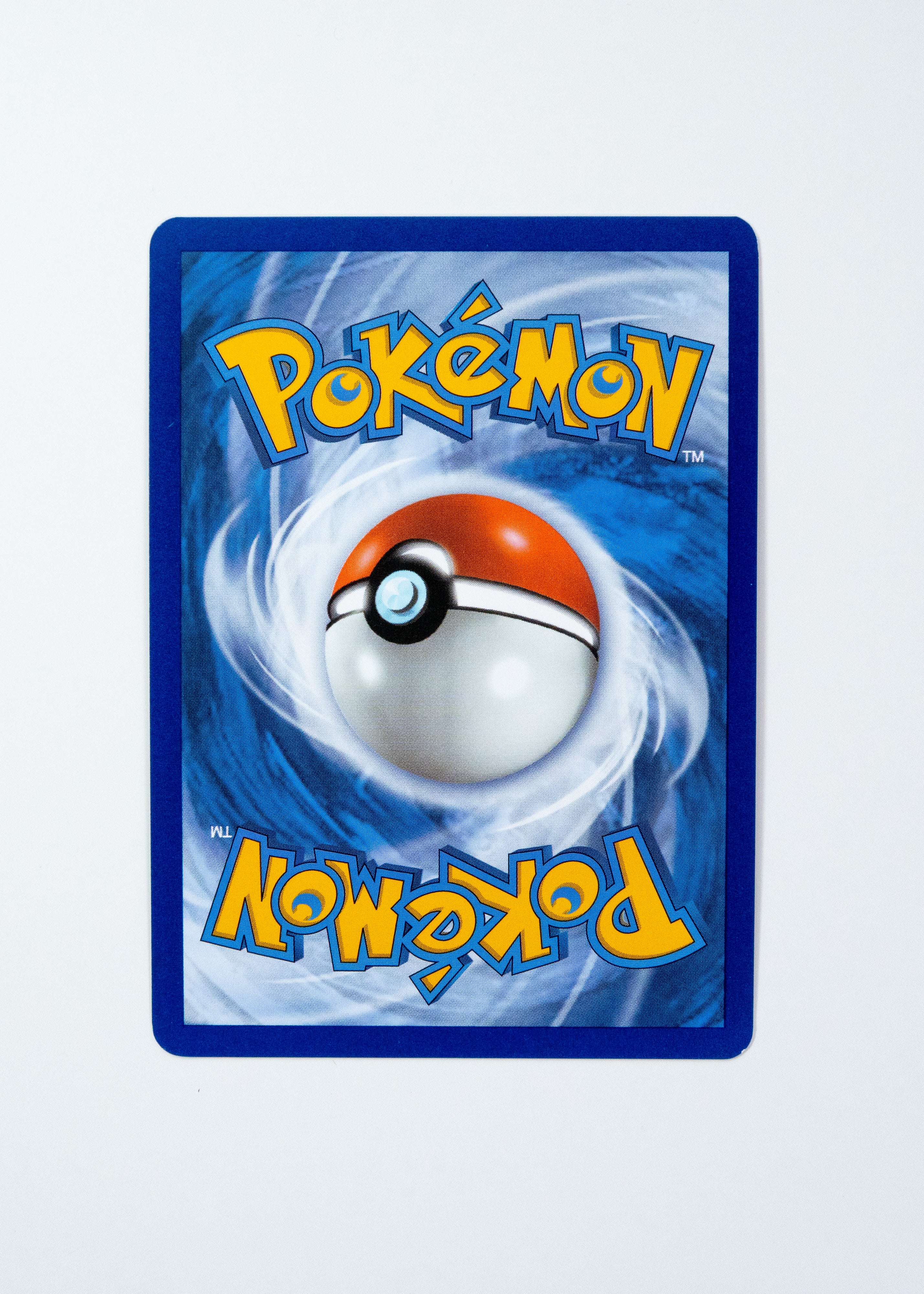 Pokémon trading card with Pokéball design on a blue and white background