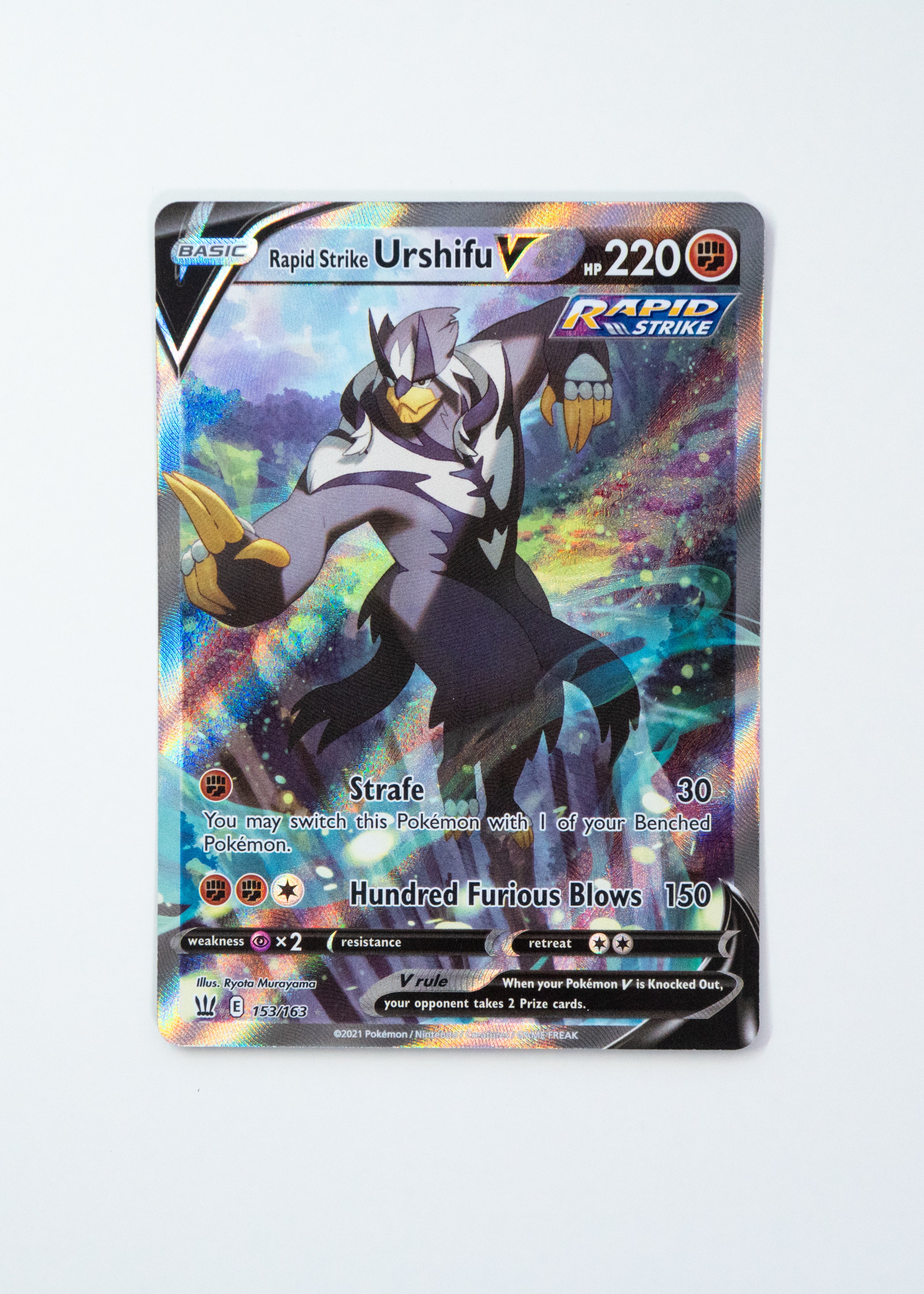 Pokémon trading card featuring a character with a colorful background