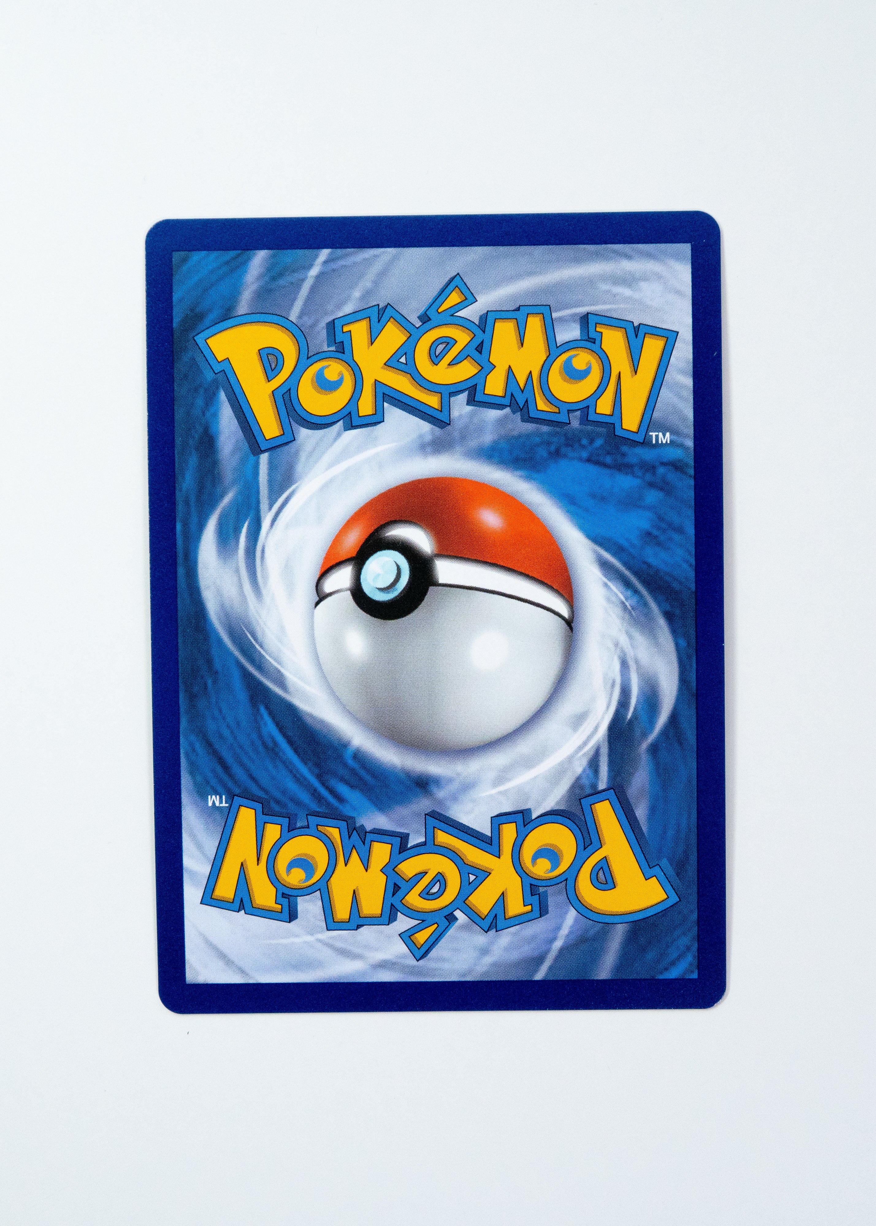 Pokémon trading card with a blue border and central Poké Ball design on a white background
