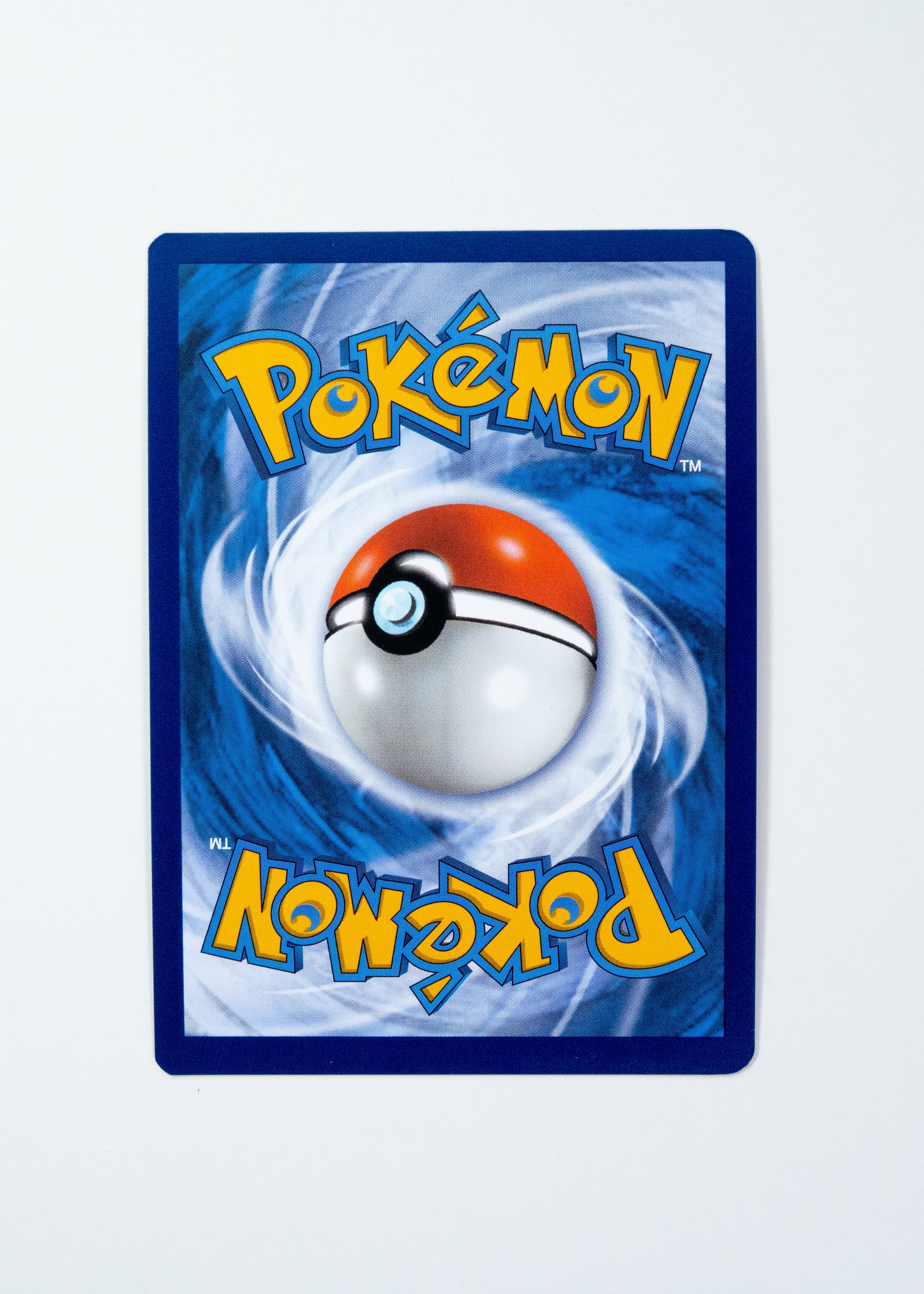 Pokémon trading card with a Poké Ball design on a blue border