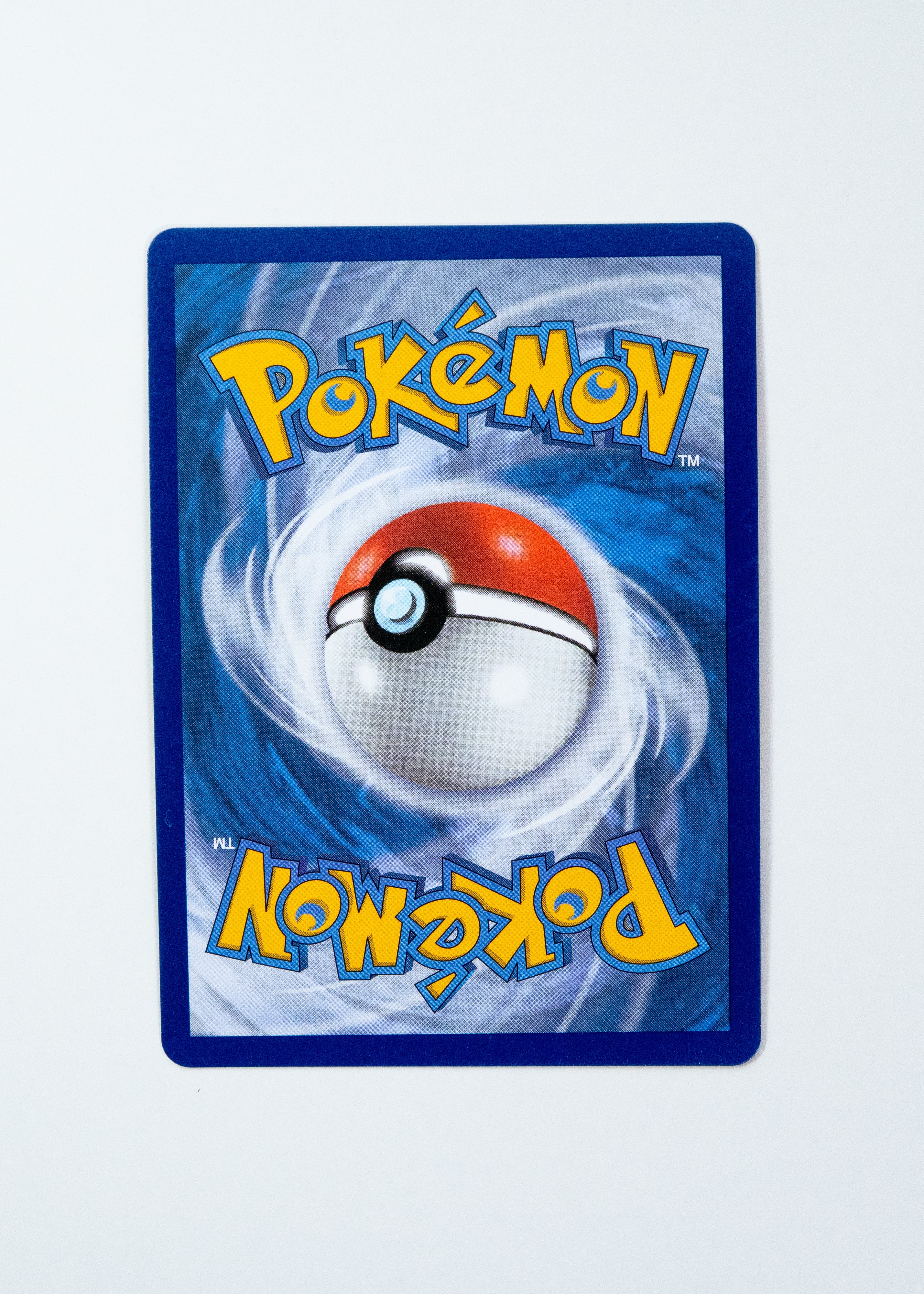 Pokémon trading card with a Poké Ball design on a white background