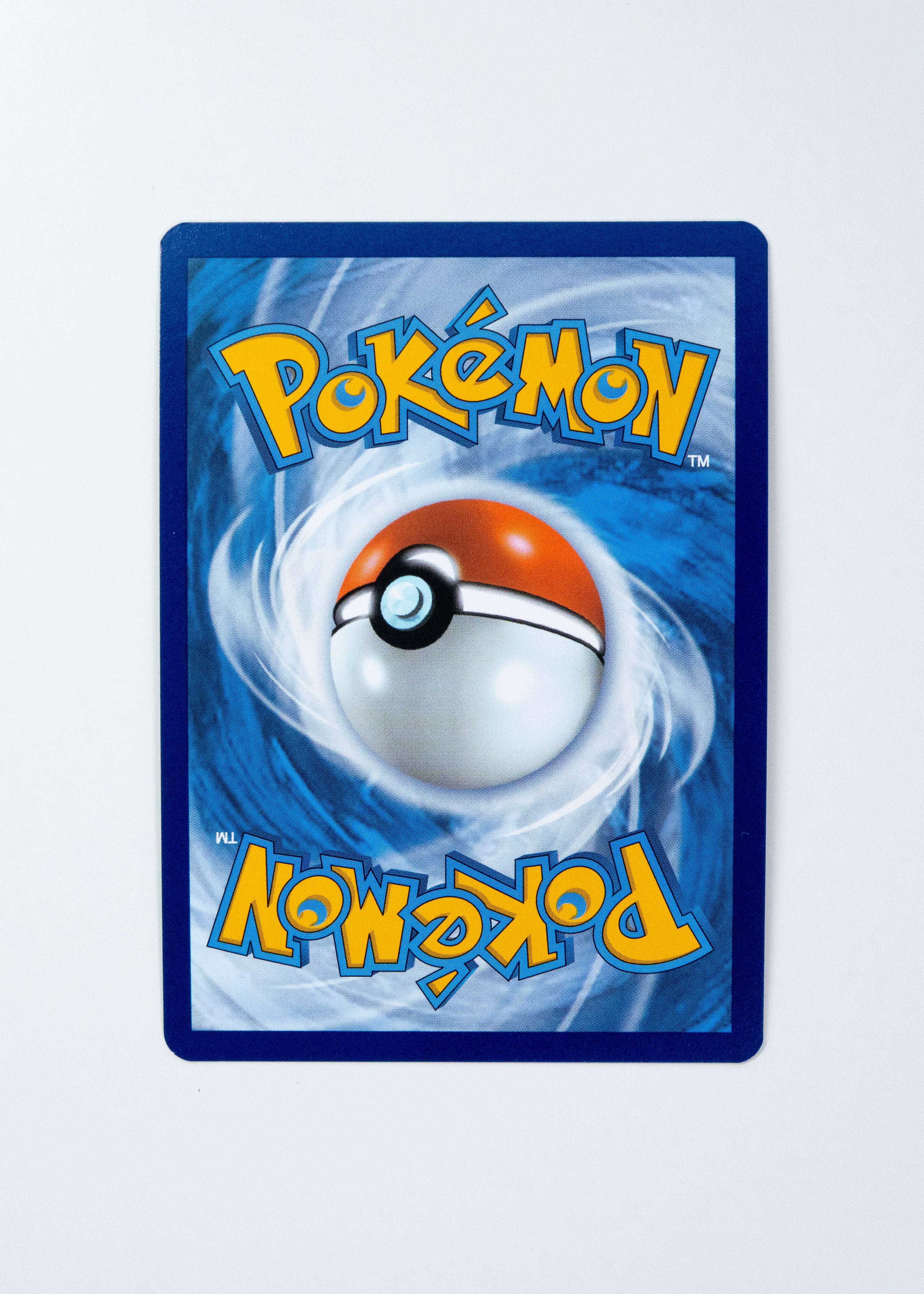 Pokémon trading card with a Poké Ball design on a blue and white background